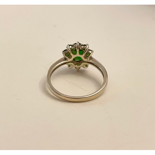 389 - A 9ct yellow gold and Russian chrome diopside cluster ring, set with a mixed oval-cut and round-cut ... 