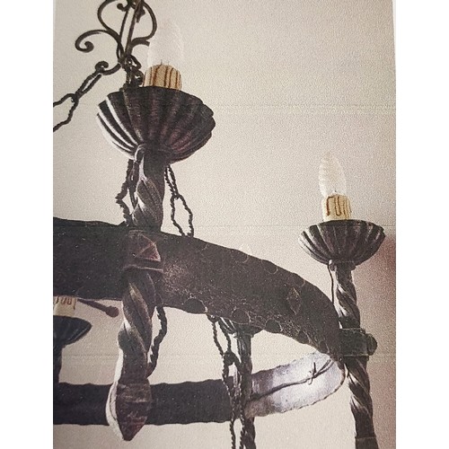 1 - Two medieval style chandeliers (Italian castle style), 65cm drop, 60cm width, together with four mat... 