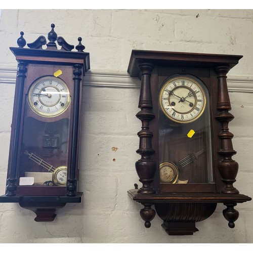 61 - Two wooden cased wall clocks, on with broken pediment and finial decoration, the other with turned c... 