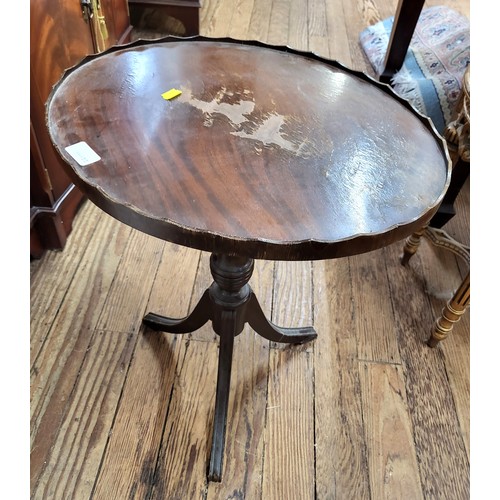 25 - Three side tables, one oval tripod table (some damage to surface), 56cm x 46cm x 37cm, one circular ... 