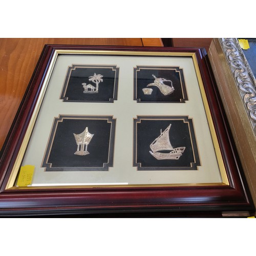 123 - Framed knife and three plated items, framed