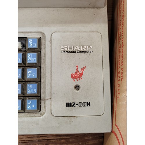 125 - Sharp MZ-80K personal computer with a built in cassette recorder. A multi-functional personal comput... 