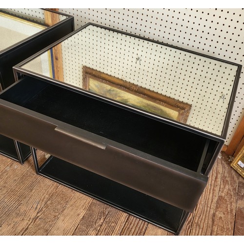 39 - A pair of gun metal mirror-top open cabinets with drawer. 58cm x 71cm x 51cm