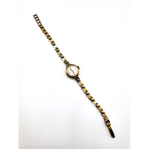 369 - A 9ct yellow gold ladies Rotary wristwatch, with round baton dial, on fancy-link 9ct yellow gold str... 