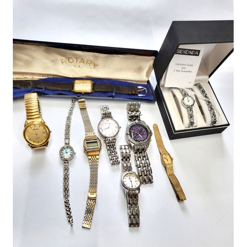 373 - A collection of nine watches including a gentleman's Emporio Armani dress watch with a vintage rotar... 