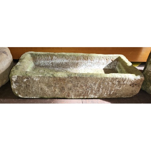 35 - Four stone troughs, two round 28 cm and 36 cm and two rectangular 50cm x 23cm and 34cm x 27cm.