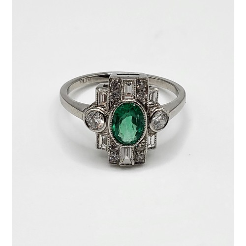 373 - A platinum, diamond, and emerald Art Deco style ring, set with a mixed oval-cut emerald of approxima... 