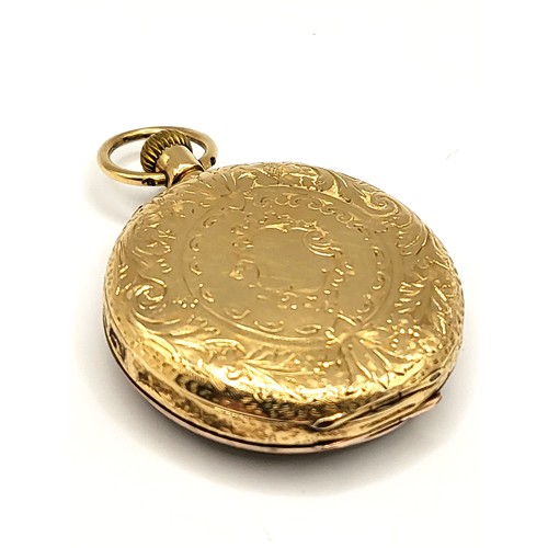 393 - An 18ct yellow gold Victorian fob watch, with engraved gilt dial and enamel Roman numeral markers, f... 