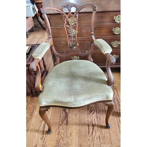 68 - A late 19th / early 20th century style armchair, having decorative back splat, with upholstered arms... 