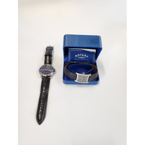 403 - Two watches, includes a gentleman's Lorus Quartz day/ date on a leather strap and a gentleman's Rota... 