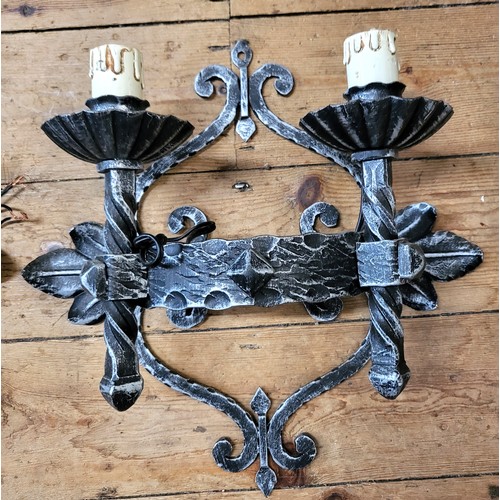 37 - Four matching metal wall sconces (Medieval Italian castle style), 45cm high, 40cm width.