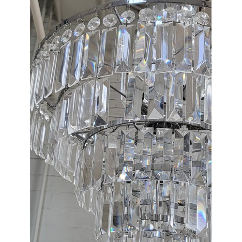 20 - A glass chandelier with rectangular glass drops 68cm x 45cm.