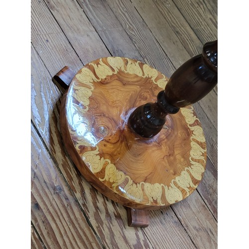 40 - A late 20th century circular marquetry occasional table on a turned pedestal. 62cm x 52cm.