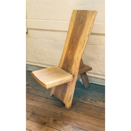 53 - An oak chair (hand-made in three pieces). 104cm x 60cm