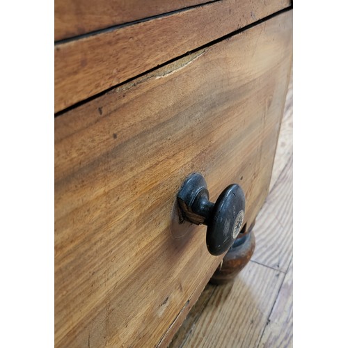 59 - A mahogany chest of drawers, two small drawers over 3 long, on bun feet. Two knobs are missing and f... 