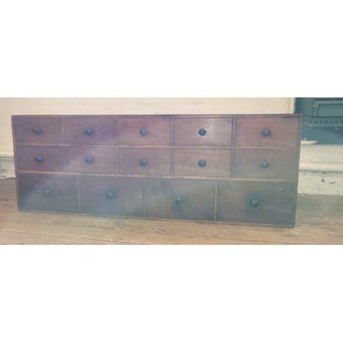 61 - A tool drawer unit, ten small over four long drawers. 40cmx 110cm x 23cm.