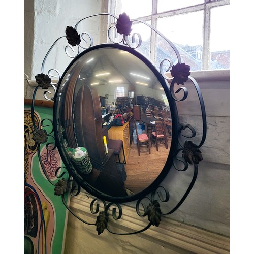 62 - A group of five mirrors: a decorated gilt framed and bevelled mirror 68cm x 55cm, a small oval  wood... 