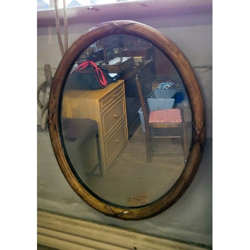 62 - A group of five mirrors: a decorated gilt framed and bevelled mirror 68cm x 55cm, a small oval  wood... 