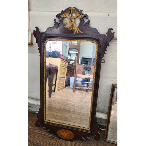 62 - A group of five mirrors: a decorated gilt framed and bevelled mirror 68cm x 55cm, a small oval  wood... 