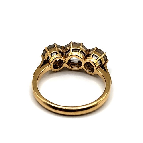 332 - An 18ct yellow gold and white zircon ring, set with three natural zircons, size O 1/2.