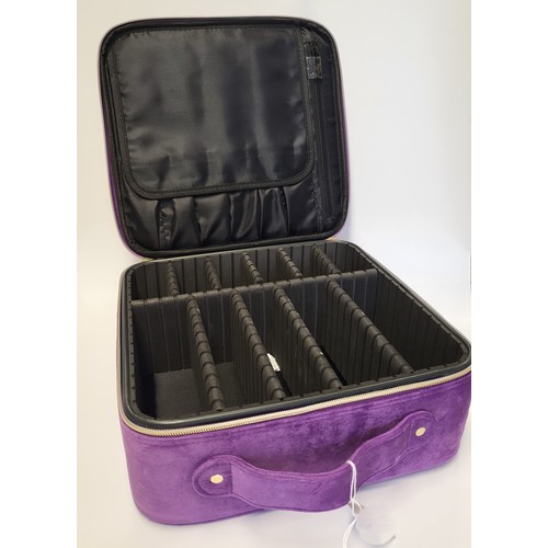 341 - A purple fabric travelling jewellery case, with zips and handle, square.