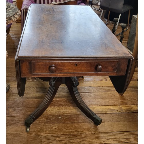 70 - An early 20th century Pembroke table, drop-leaf, with fitted drawer to one end, supported on pedesta... 