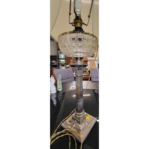 32 - Two crystal stem lamps with modern shades ( 78cm and 69cm) and a silver plate lamp with modern shade... 