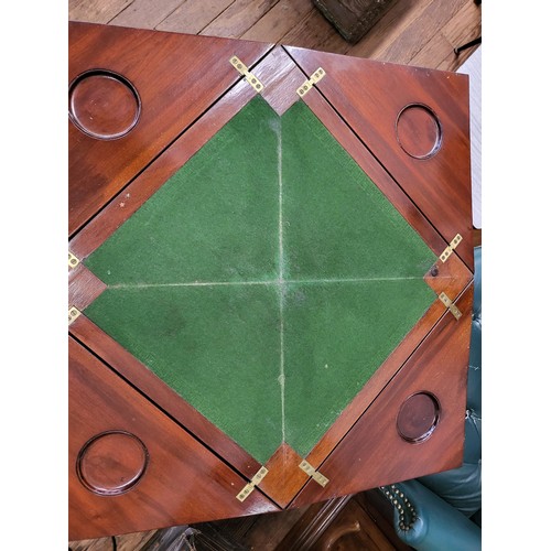 34 - A Georgian square folding card table with a drawer. Corners fold into the centre of the table. 73cm ... 