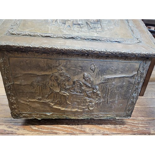 65 - Antique/ vintage wooden chest with slanting lid and featuring figures socialising on exterior. 52cm ... 