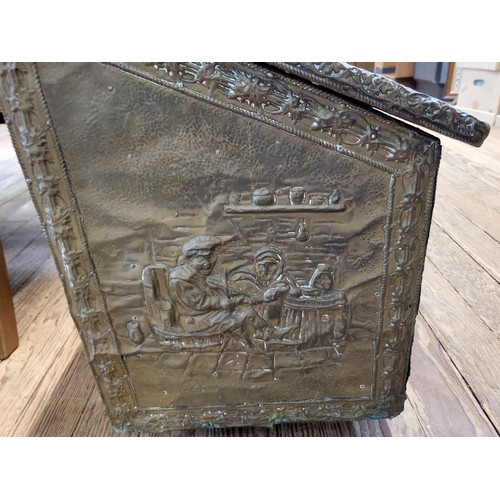 65 - Antique/ vintage wooden chest with slanting lid and featuring figures socialising on exterior. 52cm ... 