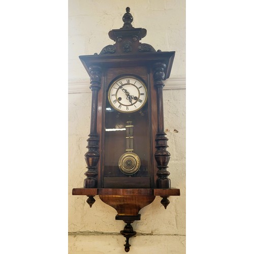 74 - A walnut and mahogany Vienna wall clock