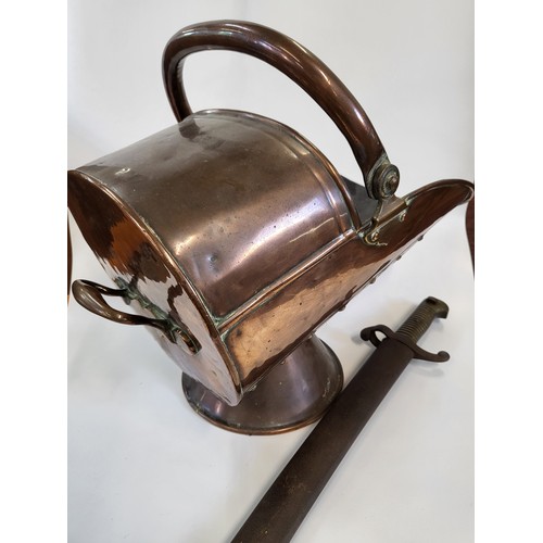 102 - A copper coal scuttle and a sword