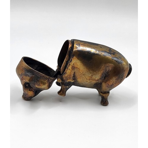 106 - A brass cased pig vesta case. 32g. 6cm x 3.5cm