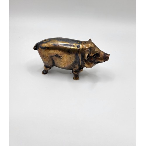 106 - A brass cased pig vesta case. 32g. 6cm x 3.5cm