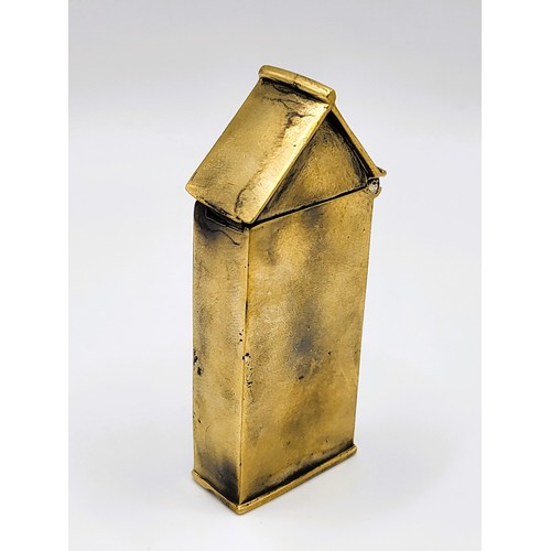 107 - A brass cased vesta case in the form of a century box with enamel plaque. 35g. 6cm x 2.5cm x 1cm.