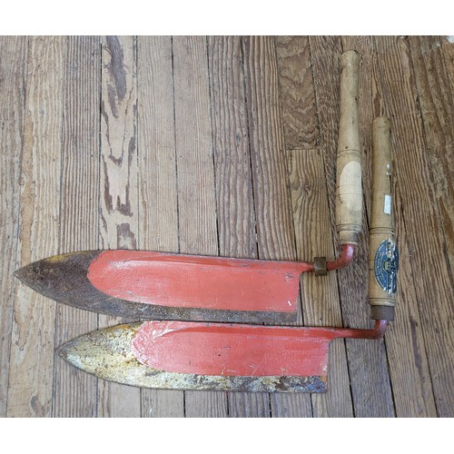 114 - A pair of 1940's hay blades. (blades 63cm)