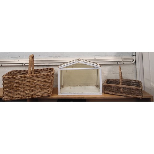 127 - A wicker basket 42cm x 50cm x 35cm, wicker basket 27cm x 37cm x 25cm, and a small greenhouse 35cm x ... 