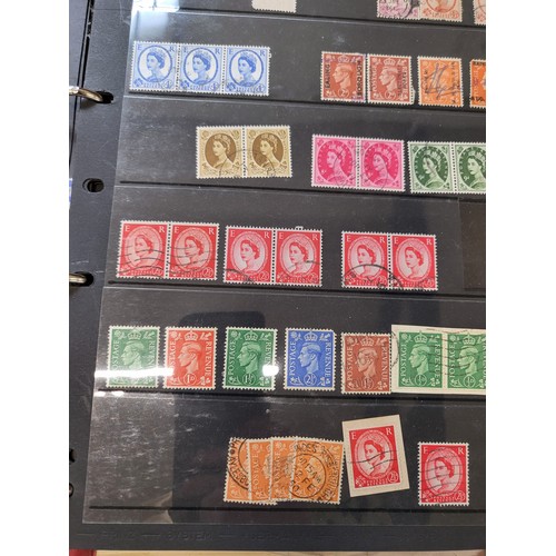 153 - British stamps in several albums and a folder with loose stamps