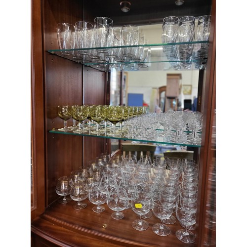 156 - Twelve wine glasses with tinted cup-shaped bowls and sets and part sets of wine glasses and Brandy g... 