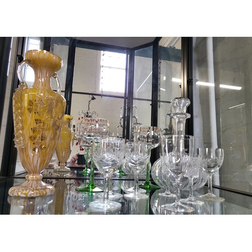 166 - A pale yellow glass vase with twin handles 28.5cm, decanter and ten wine and sherry glasses and Seve... 