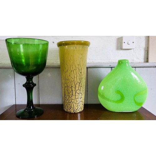 174 - A green giant wine glass with cup shaped bowl and bladed knop stem 41cm (small chip), a glass beaker... 