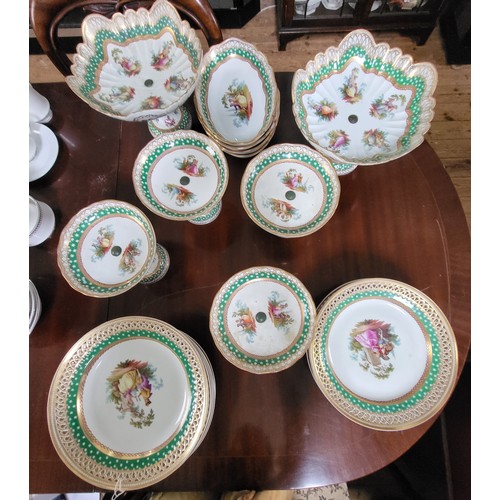 183 - European porcelain printed dinnerwares with green and gilt borders, some with sceptre or sword marks... 