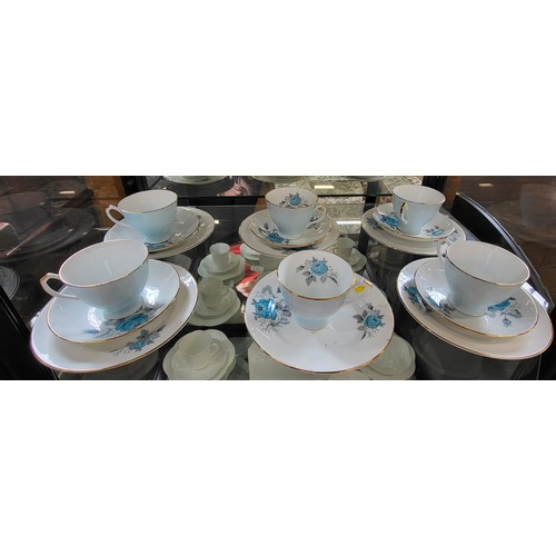 185 - Imperial Contemporary blue rose pattern cups, saucers and plates. (17)