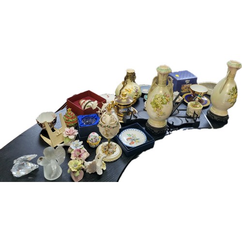 197 - Ceramic ornaments including Foley, Spode, Wedgwood, a frosted glass angel and a cut glass swan. (30)