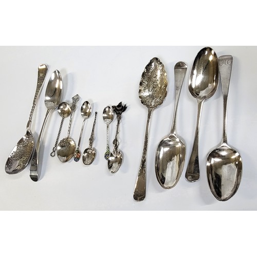 233 - A collection of silver spoons including a Hester Bateman 1786 , a spoon with a Charles I coin as the... 