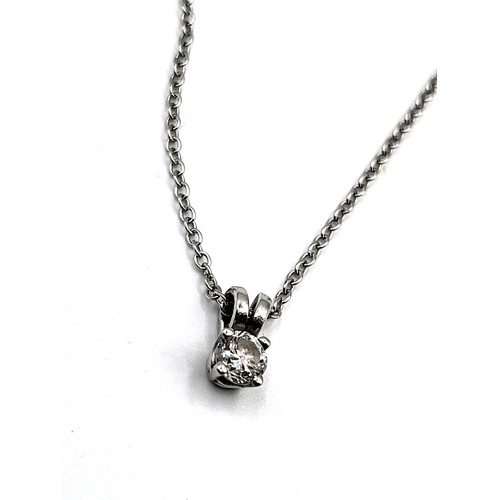 244 - A diamond pendant in 18ct white gold. 2.1g,  round brilliant cut diamond, 1/5 carat. Chain is 46cm.