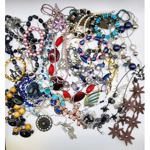 252 - A collection of costume jewellery including necklaces, brooches and earrings, and a lapis, turquoise... 