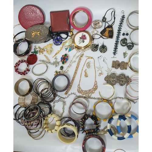 256 - Costume jewellery including earrings, pendants, necklaces, frog brooches, a silver Art Deco pendant,... 