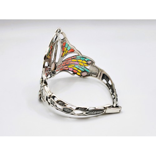 266 - A silver and plique a jour Art Deco style cuff bangle with opal-style cabochons. 24g. 4cm x 6cm diam... 