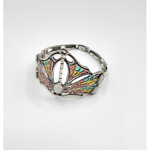 266 - A silver and plique a jour Art Deco style cuff bangle with opal-style cabochons. 24g. 4cm x 6cm diam... 